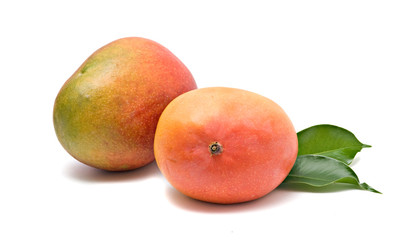 Two mangoes section isolated on white background