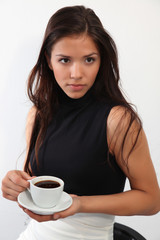 young charming girl having a coffee