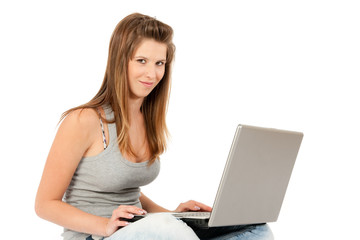 Naklejka premium Beautiful Sixteen Year Old Teen Girl With Laptop Computer
