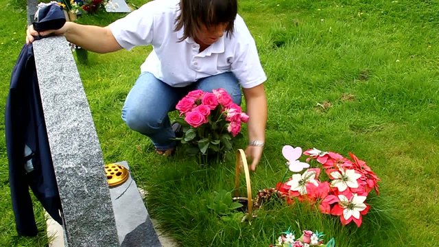 womam at cemetery