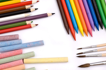 Fototapeta premium Colorful pencils, crayons, chalks and paintbrushes