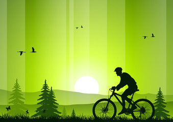 Naklejka premium Mountain bike at sunset