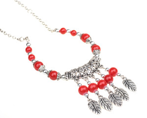 Silver necklace with red beads