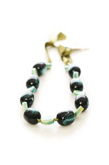 Woman necklace isolated on the white background