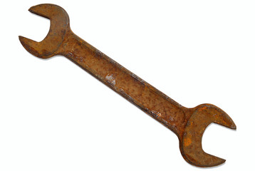 Rusty old spanner isolated on a white background.