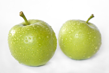 Two green fresh apples