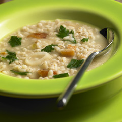 pot barley soup with pork meat pieces