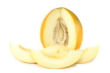 Ripe melon with sliced over white background. Isolated