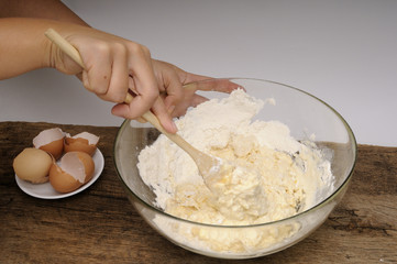 mixing egg with flour