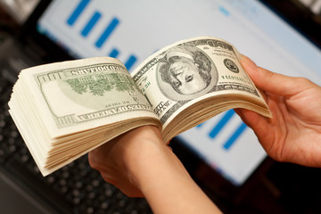 person shows money in hands