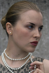 Beautiful girl with a white beads