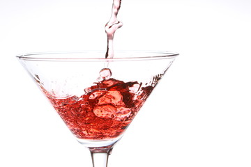 red cocktail on white