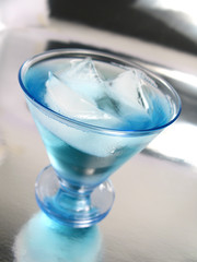 Curacao blue, orange liquor with blue artificial color cocktail