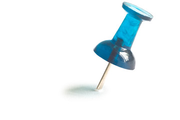 Blue drawing pin with shadow.