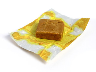 Block of dehydrated flavor on white background