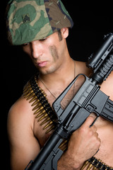 Fototapeta premium Military Man Holding Gun