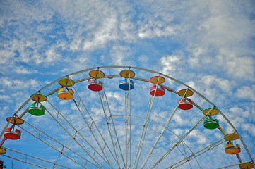 Beautiful Ferris Wheel Gorgeous Summer Sky as a Background.