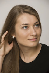 portrait of girl of blonde remedies a hand hairs