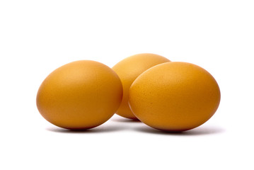 Three eggs isolated on white background
