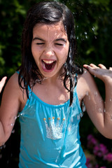 Little girl playing with water