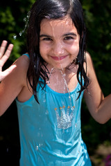 Little girl playing with water