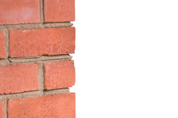Obraz premium Fragment of a red brick wall (with empty space for your text)