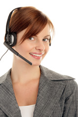 Friendly secretary/telephone operator wearing headset