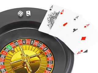 The casino roulette and playing cards. Isolated