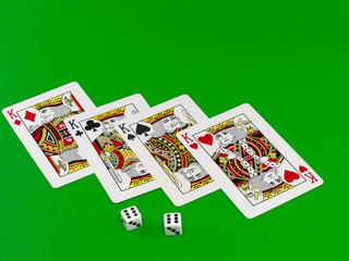 The dice and playing cards on green broadcloth.