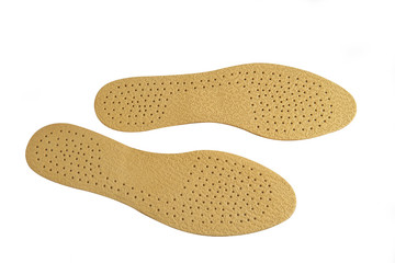 Paire de semelles de chaussures sur fond blanc