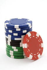 Pile of poker chips isolated on white.