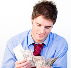 Businessman counting dollars