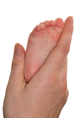 isolated baby leg in mother hand