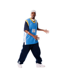 Fototapeta premium Hip-hop young man making cool move on white background