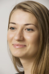 Obraz premium young girl blonde with long hairs portrait