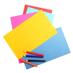 Colorful papers and crayons