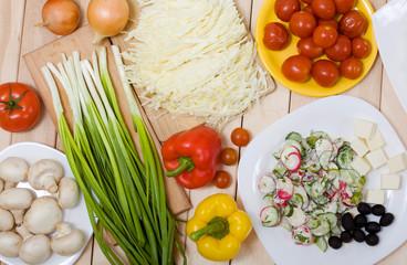 Fresh vegetables, mushrooms and served salad