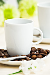 cup with coffee beans