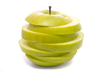 Sliced green apple on studio white
