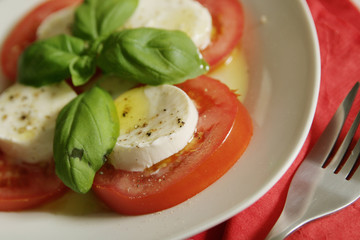 Tomatoes with mozzarella and basil