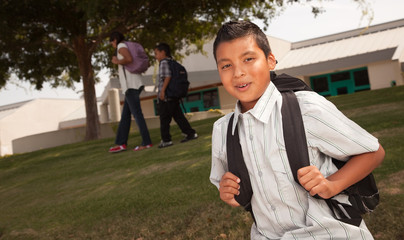 Happy Young Hispanic Boy Ready for School