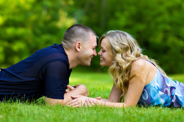 Attractive couple together on meadow