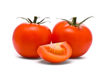 Fresh tomatoes. Macro studio isolated on white.