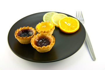 Jam Tarts with Citrus Slices and Fork