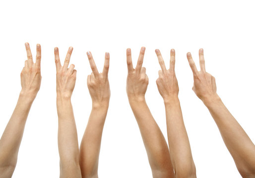 Hands showing victory sign