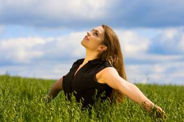Young woman relaxing on nature.