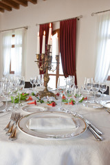 Fine table setting in gourmet restaurant