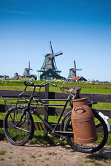 Bike with milk-can and windmills at Netherlands