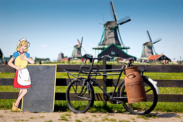 Bike with milk-can and windmills at Netherlands