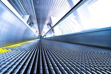 Camera is lying on escalator